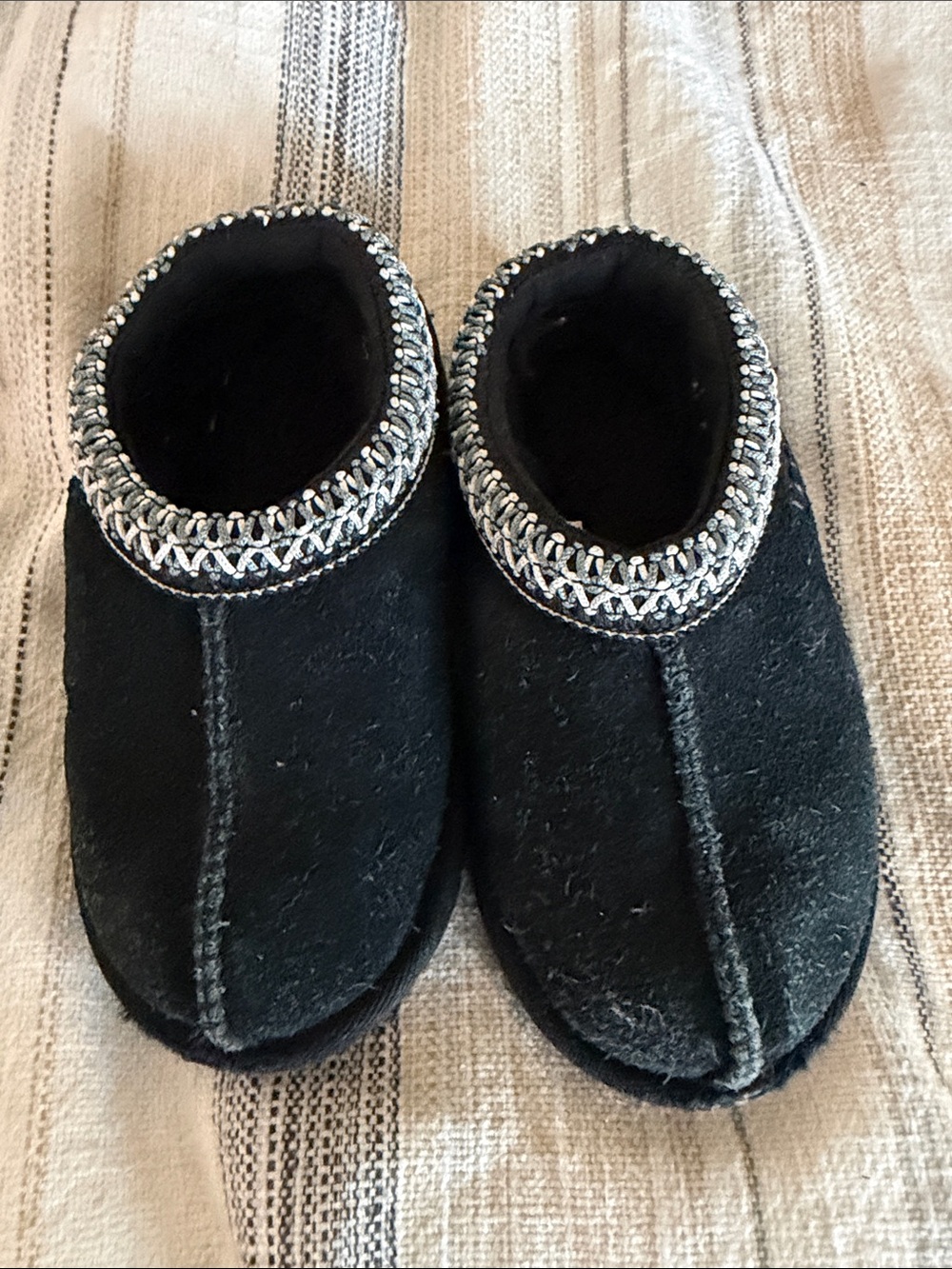 UGGS Kids Black Slip-On Cozy Slippers with Decorative Trim